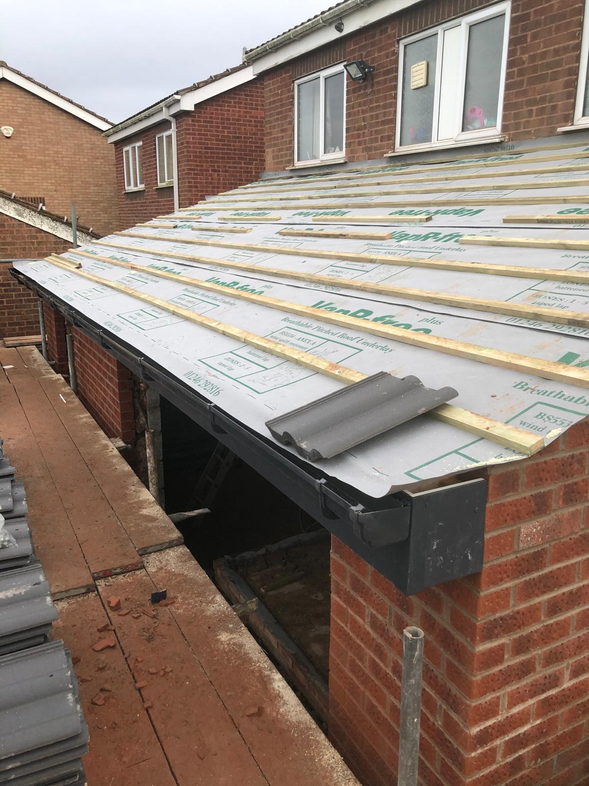 Roofing felt and tile battens on rear extension